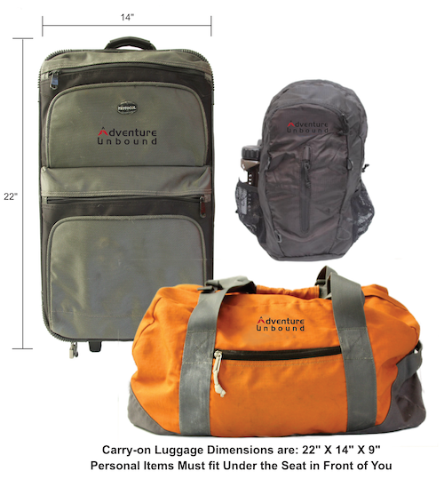 Adventure Unbound branded green suitcase and orange duffel bag 