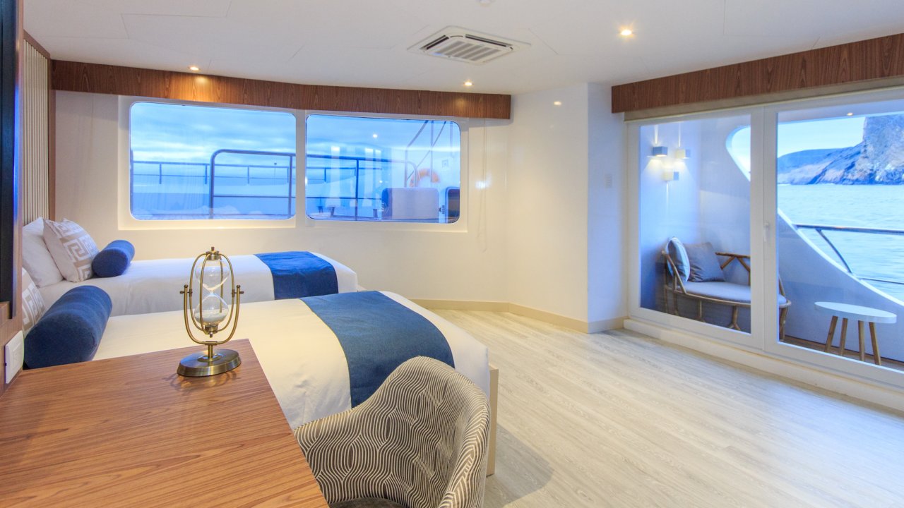 Twin stateroom cabin overlooking the water in the Galapagos on a Catamaran ship