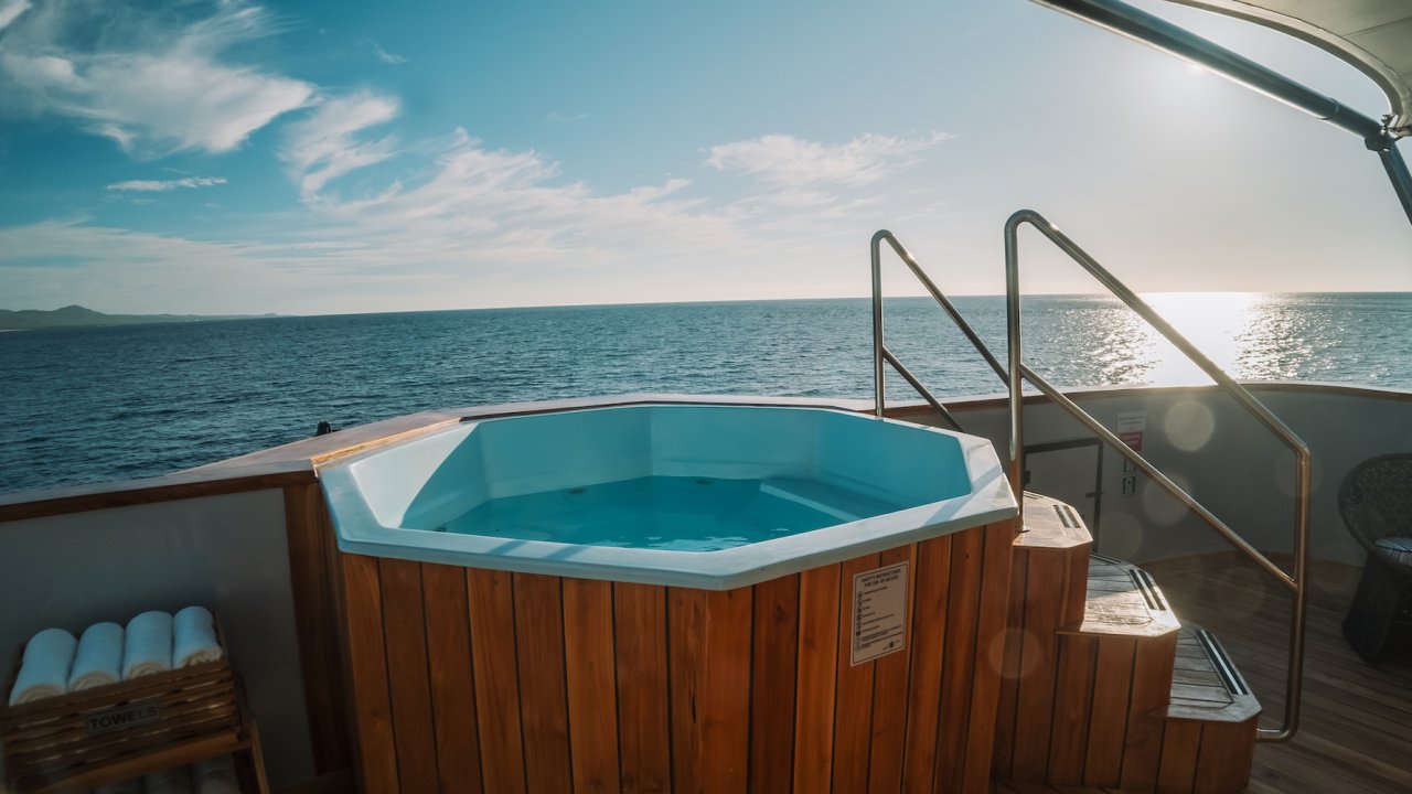 Hot tub on the sundeck of luxury small cruise ship