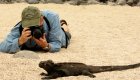 Man photographing Iguana 