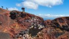 Group of people hiking on a volcano in the Galapagos Islands