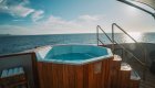 Hot tub on the sundeck of luxury small cruise ship