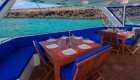 dining tables on sailing catamaran