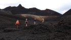 People hiking on a volcano in the Galapagos
