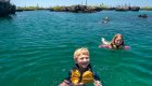 kids swimming galapagos